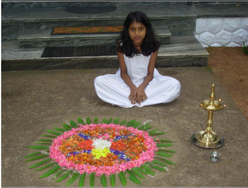Little Girl with her Pookalam